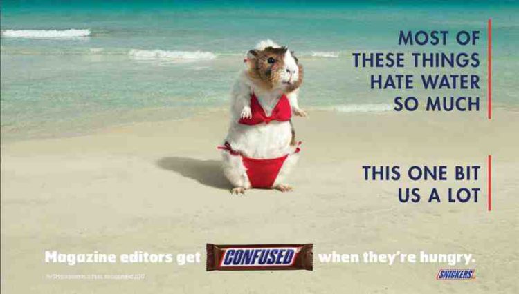 Snickers plays with Sports Illustrated's Swimsuit Issues once again 2