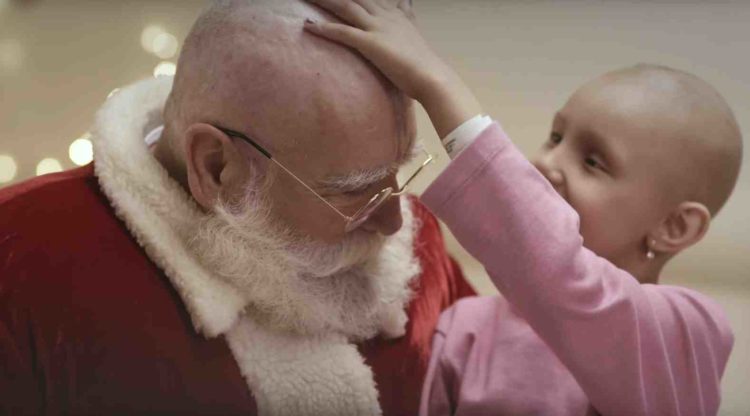 Santa Claus goes bald to empathize with sick kids in Canon's holiday film