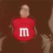 Danny DeVito bathes in chocolate in a Super Bowl ad for M&M’s