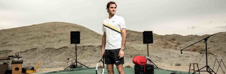 Tennis icon Roger Federer plays some music with his racket